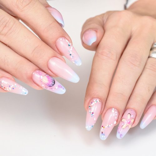 Beautiful,Female,Hands,With,Manicure,On,A,Light,Background,With Beautiful,Female,Hands,With,Manicure,On,A,Light,Background,With